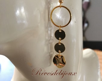 long gold-plated earrings pierced