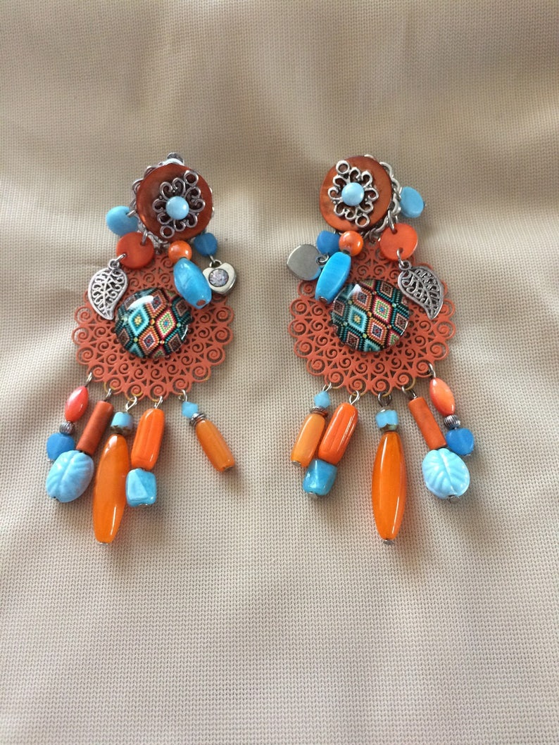 Very pretty fancy earrings clips of orange and light blue