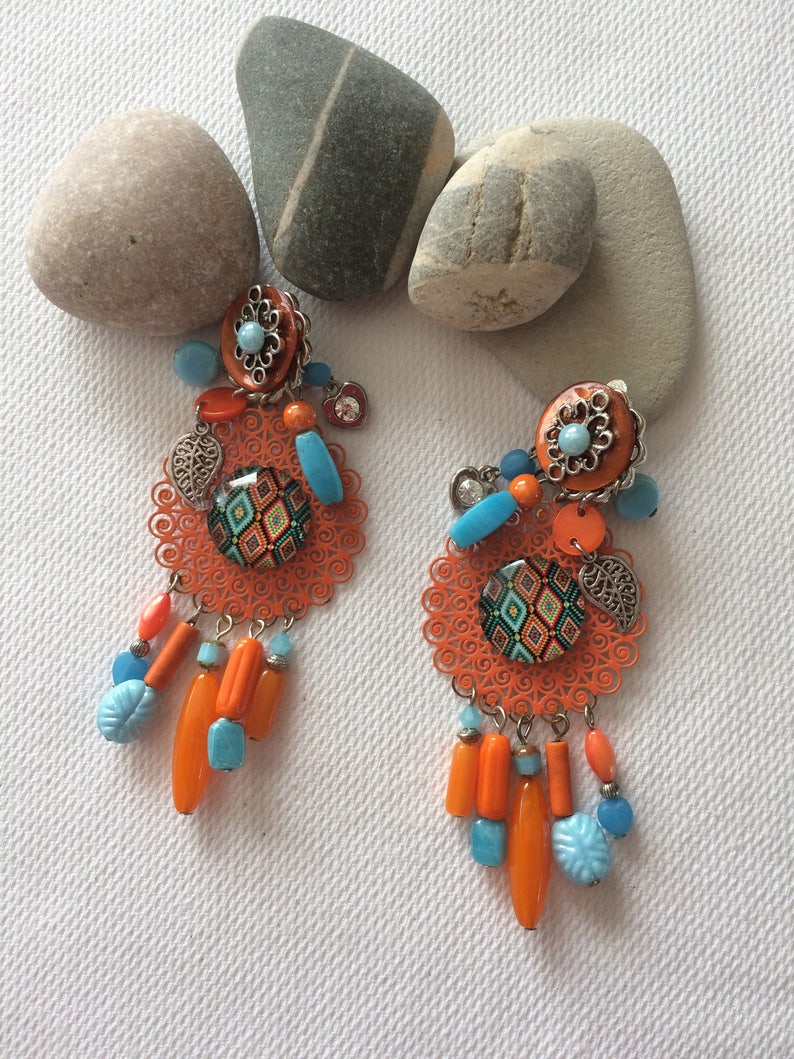 Very pretty fancy earrings clips of orange and light blue