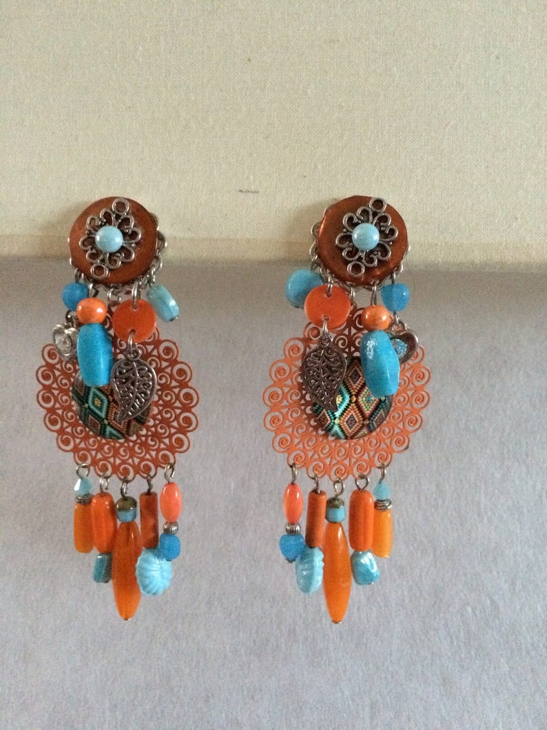 Very pretty fancy earrings clips of orange and light blue