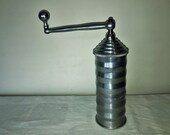 Antique coffee Mill in aluminium cylindrical wavy, signature E. Föckler. Antique Coffee Grinder. Old Coffee Mill