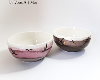 Hand-painted porcelain ceramic bowl with bird motif, nature design.