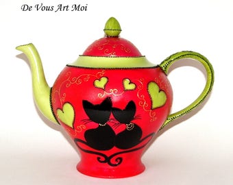 Hand-painted ceramic porcelain teapot, a gift with a cat theme.