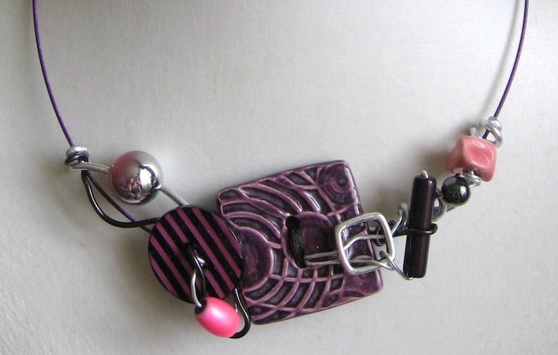 Graphic design necklace handcrafted ceramic button and jewelry wire