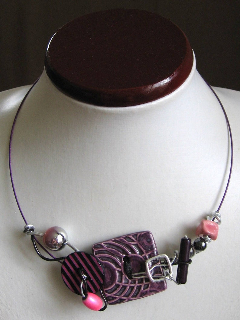 Graphic design necklace handcrafted ceramic button and jewelry wire