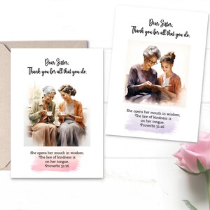 May include: A greeting card with a watercolor illustration of two women sitting together. The card has the text "Dear Sister, Thank you for all that you do." and a Bible verse from Proverbs 31:26.