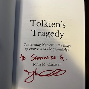 May include: A set of three ceramic mugs with a speckled, matte finish. The mugs are in shades of cream, light gray, and dark gray. Each mug has a simple, minimalist design, perfect for coffee or tea.