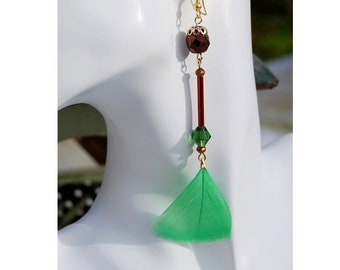 Very long earrings, green natural feather, movable, light, original, faceted Czech glass.