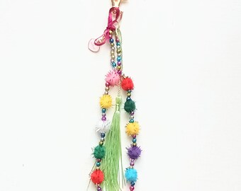 Bijou de sac pompoms,