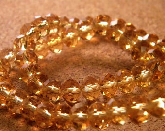 35 Austrian Crystal Glass Beads Faceted - Amber - 8mm x 6mm - PE73