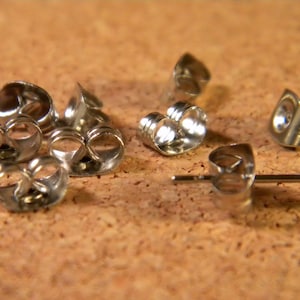 100 buttons in metal silver color pierced BO2 nails