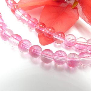 40 perle di vetro 8 mm - perla rossa bicolore, vetro elettrolitico, vetro traslucido, inserto glitter dorato, - Q411-9