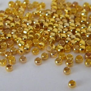 300 Quetschperlen 2 mm goldene Fassform (3 gr) - PF140-7