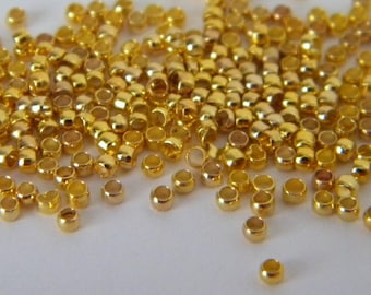 300 crimp beads 2 mm golden barrel shape (3 gr) - PF140-7