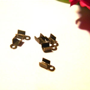 100 crushing tips, 6 X 3mm tips, crimping ends, cord ends, chain ends, bronze, Q23