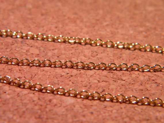 M chaîne trés fine maille forçat- mm x mm doré chaine