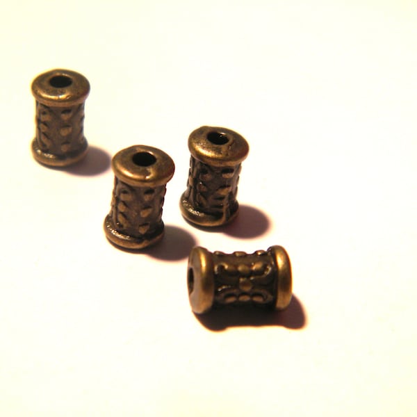 25 perle intercalaire bronze , perle métal, perle  entretoise, 7 x 5 mm, perle tube bronze, Q51
