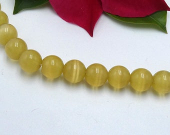 6 mm glass bead - cat's eye- cat eyes- 12 cat's eye glass beads- 6 mm- yellow Q282