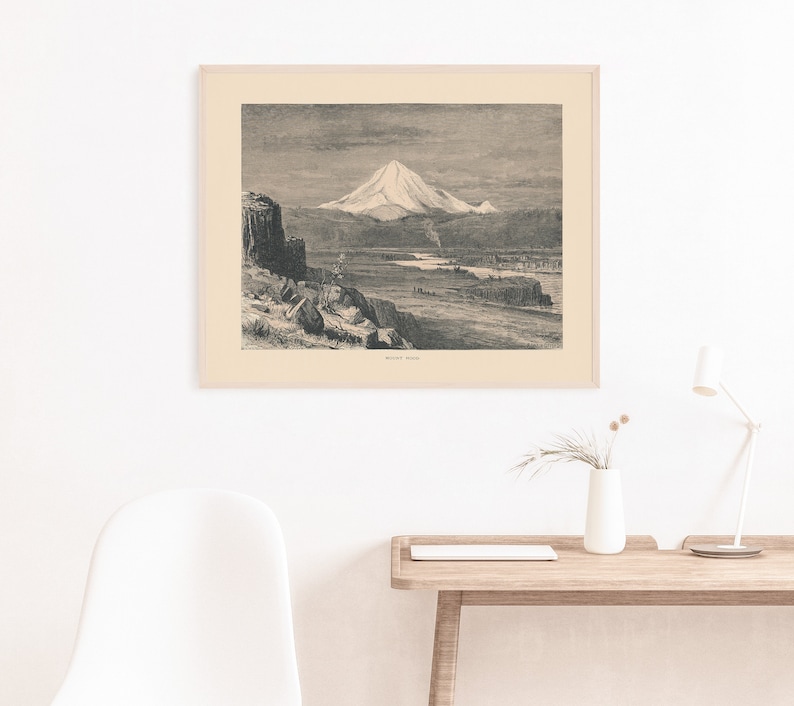 May include: A black and white vintage illustration of Mount Hood, a snow-capped mountain, with a river and trees in the foreground.