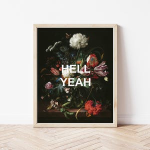 May include: A framed print of a still life painting featuring a vase of colorful flowers with the text "HELL YEAH" in white letters.