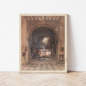 May include: A watercolor painting depicting a courtyard scene with an arched doorway, a fountain, and figures in traditional clothing. The courtyard is surrounded by stone walls with intricate carvings. The painting is framed in a light wood frame.