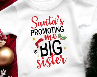 T-Shirt für große Schwestern, Santas fördert mich zur großen Schwester-T-Shirt Schwangerschaft enthüllen Weihnachten Baby enthüllen
