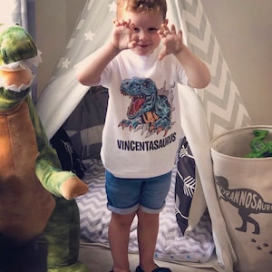 Nameasaurus Children&#39;s personalised dinosaur T-shirt