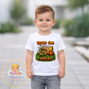 Boy wearing personalised dinosaur birthday shirt, custom name Dexter age 4, T-Rex kids t-shirt, boys dinosaur birthday outfit, outdoor lifestyle photo
