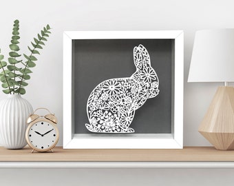 Regalo de Pascua, marco de papel recortado con diseño de conejo floral