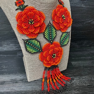 Red and black Huichol art blossom flower girl long tassel necklace jewelry Huichol style beadwork botanical necklace