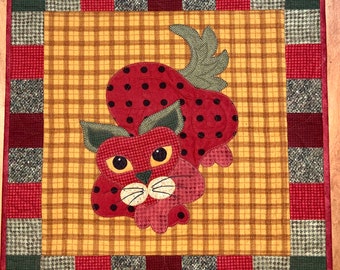 Woolly Straw Purry Quilt (gold background) by Helene Knott