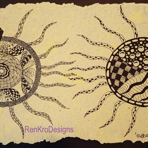 May include: A black and white ink drawing of two stylized suns with intricate patterns on a yellow background. The text "RenKroDesigns" is at the bottom of the image.