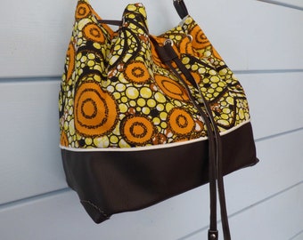 Wax bag, bucket bag, shoulder bag, handbag in imitation leather and ethnic wax fabric