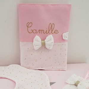 Pink, white and gold health record cover, customizable with first name