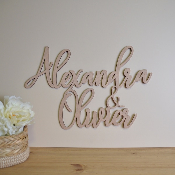 Sign two wooden first names to personalize to decorate an event or child's room