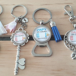 Papa-Schlüsselanhänger in Bearbeitung, Flaschenöffner-Schlüsselanhänger, Geschenk zur Geburtsanzeige, Schwangerschaftsanzeige