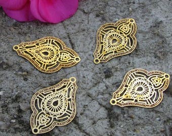 Print 4 filigree gold tone 20 mm X! outsider