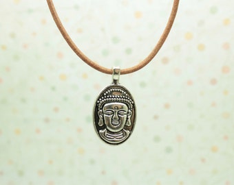 Collier tête de bouddha sur son cordon de cuir marron