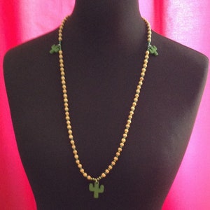 long necklace made of wooden beads and cactus charms