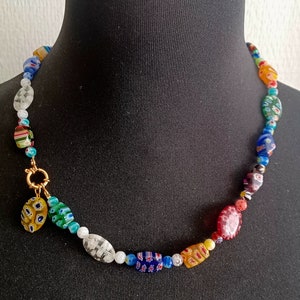 Necklace and earring set with flowered glass beads