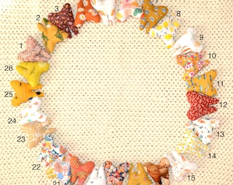 Tooth-shaped cushion for baby teeth, for the tooth fairy or the little mouse, yellow tones