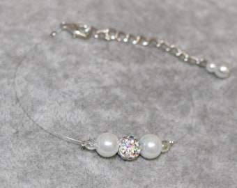 Bracelet mariage, perles blanches, bracelet mariée, perles blanche et strass, cristal swarovski, accessoire mariée, mariage, fil nylon