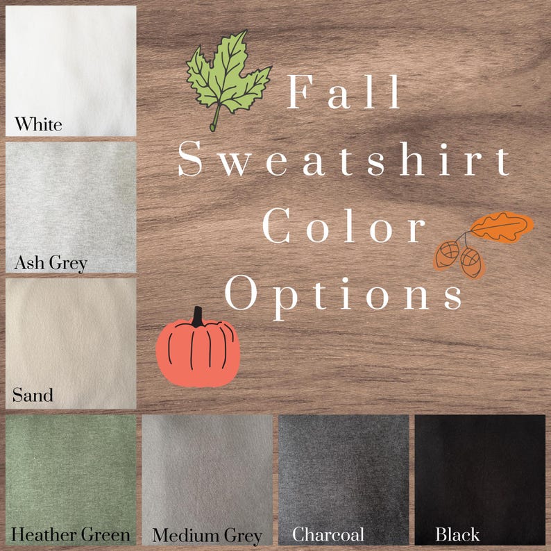 May include: A color chart displaying eight fabric swatches labeled White, Ash Grey, Sand, Heather Green, Medium Grey, Charcoal, and Black. The text Fall Sweatshirt Color Options is centered with illustrations of a green leaf, orange acorns, and an orange pumpkin.
