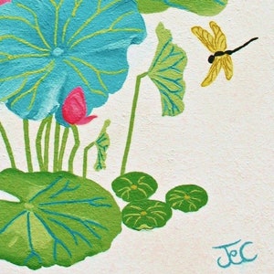 My painting of a lotus flower with green leaves and a yellow dragonfly. The background is white. My artist's signature, "JeC." is in the bottom right corner.