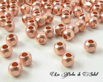 25 perles à facettes or rose en metal rondes 6mm