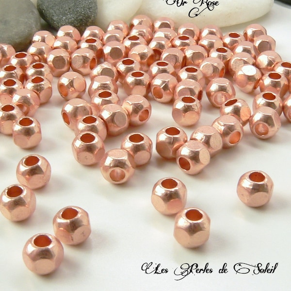 25 perles à facettes or rose en metal rondes 6mm