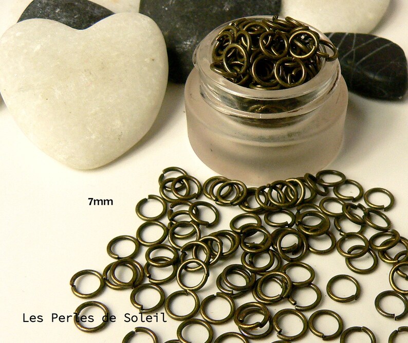 100 anneaux ouverts en metal de couleur bronze 7mm epais.10 image 1