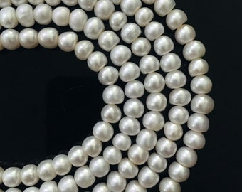 Boutons 6x7 perles de culture nacrées d'eau douce veritables blanches