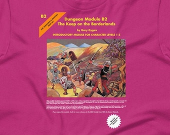 May include: A magenta t-shirt featuring the text "Dungeon Module B2 The Keep on the Borderlands" with an illustration of a fantasy battle scene. The shirt is a short-sleeved crew neck.