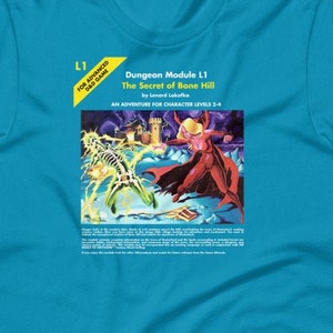 May include: A turquoise t-shirt with a Dungeons & Dragons module cover printed on the front. The cover features a red and black illustration of a skeletal figure fighting a red-skinned figure with a sword. The text on the cover reads "Dungeon Module L1 The Secret of Bone Hill by Leonard Lakofka An Adventure for Characters Levels 2-4".
